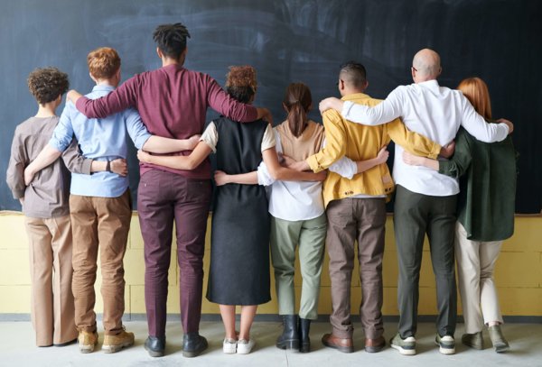 Employees Standing Shoulder To Shoulder in A Group