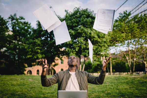 throwing paper in the air