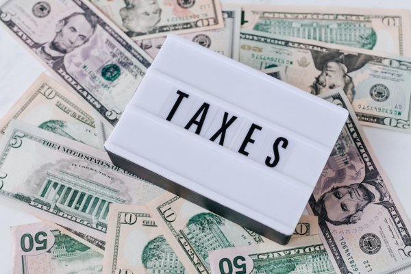 tax sign and money
