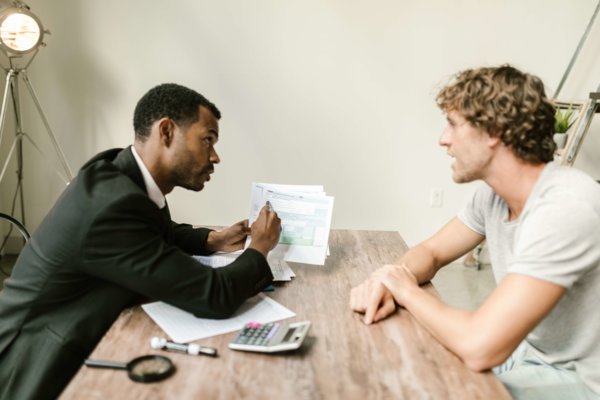 Two Men Discussing Something