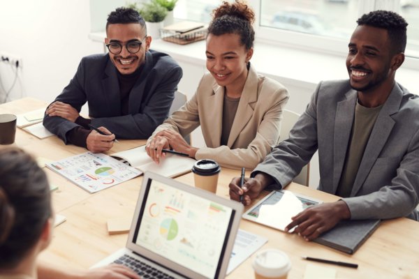 Happy Employees Having A Formal Discussion