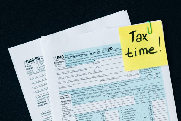 Tax Papers On A Black Background