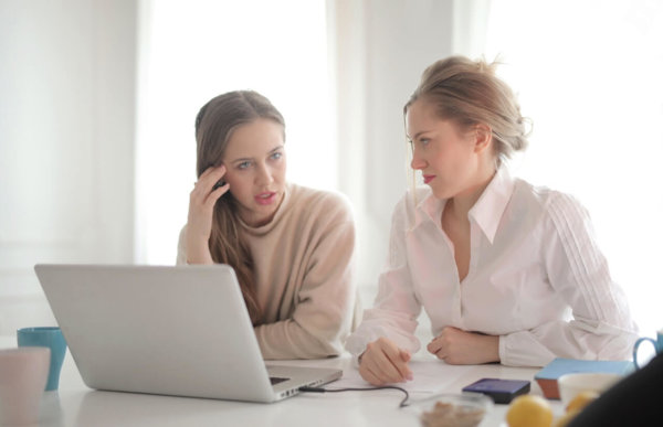 2 women on laptop